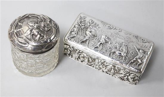 An Edwardian repousse silver box by Charles S. Green & Co, Birmingham, 1904 and a silver mounted toilet jar.